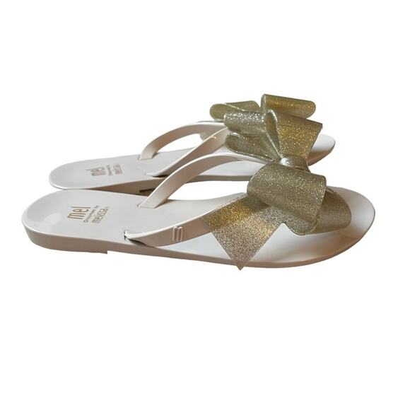 Mel by Melissa Harmonic Bow Gold Sandals Flip Flops Size 2 NEW‎ - Picture 1 of 13